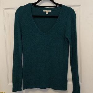 Green v-neck sweater